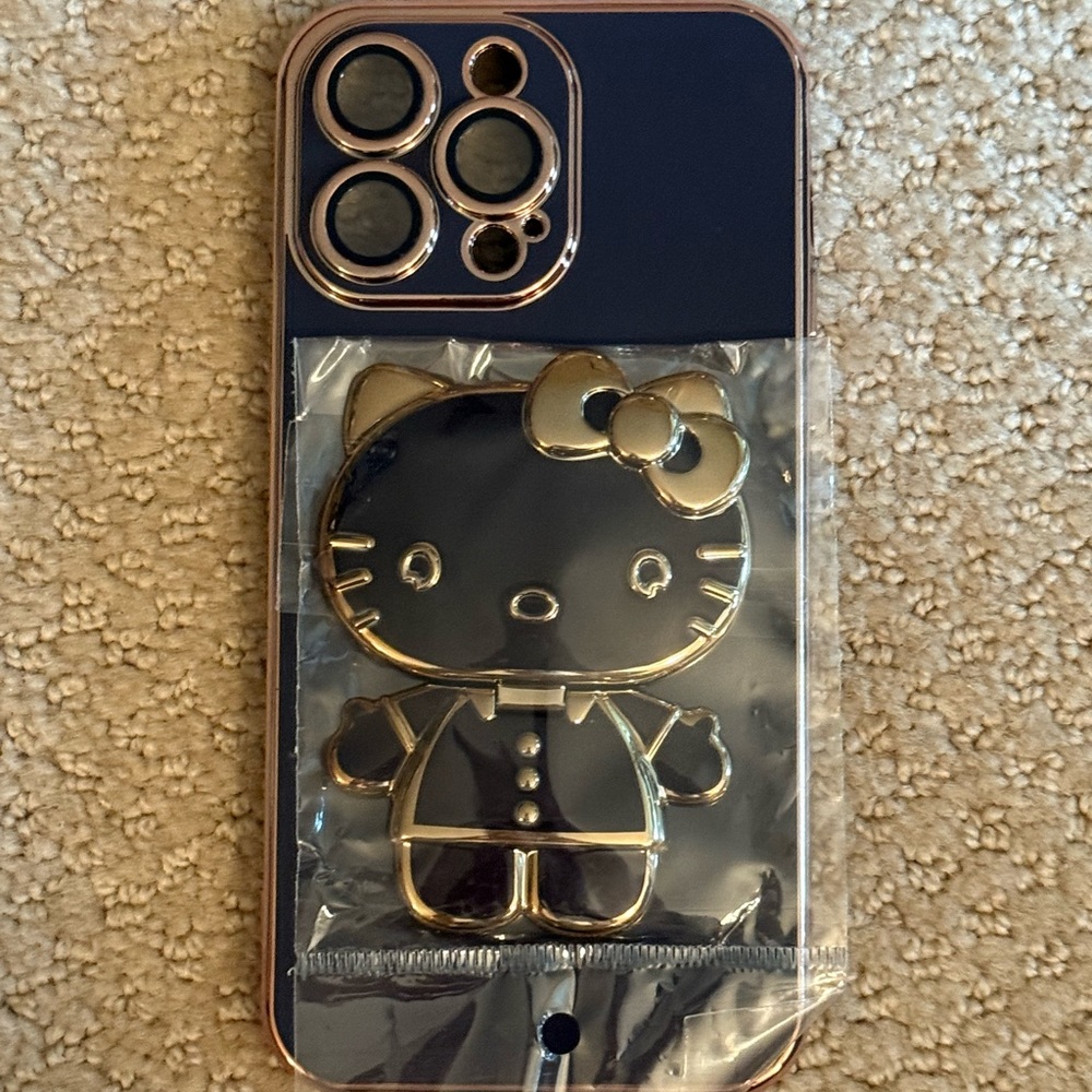 Hello Kitty Black and Gold iPhone 14 Pro Max Case with Holder